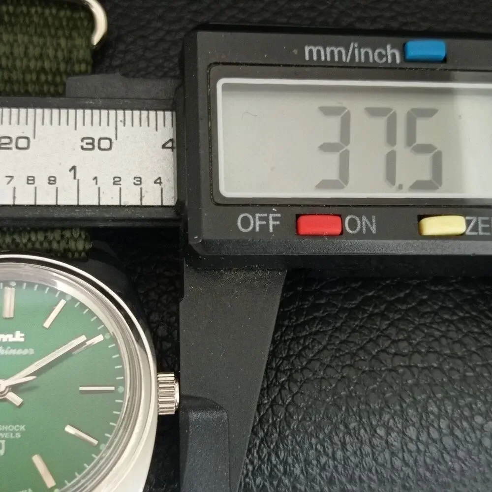 Vintage 1977 HMT Manual Wound Mens Silver Watch & Green accents
